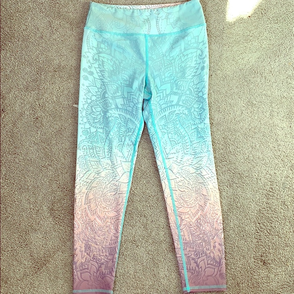 Blue and pink patterned leggings.